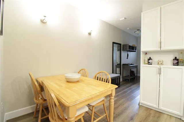 a view of a dining room with furniture