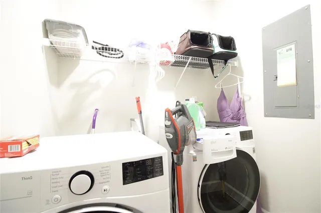 a utility room with dryer and washer
