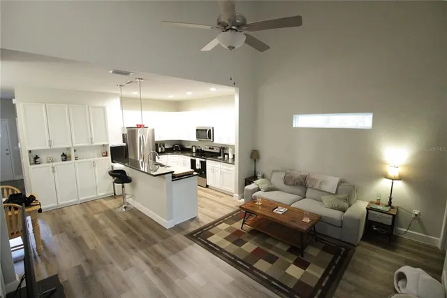 a living room with furniture and a table