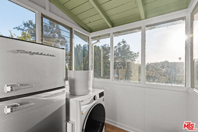 a view of pool with patio