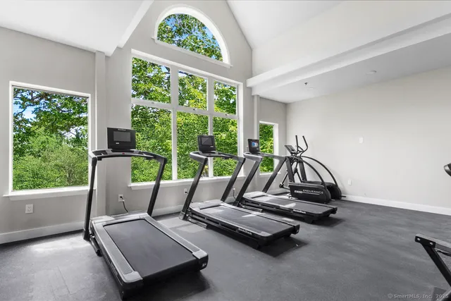 a living room with furniture and windows