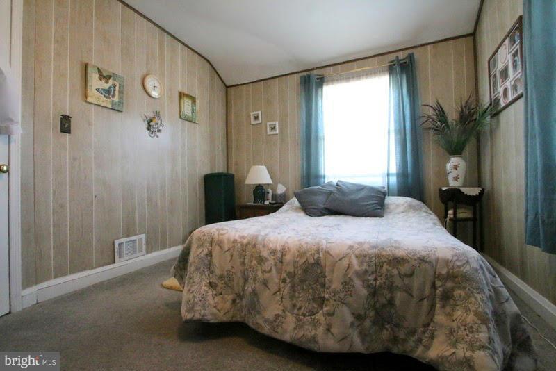 1904 Nevill Road Baltimore, MD 21222 - Photo 14 of 30 a bedroom with a bed and a window