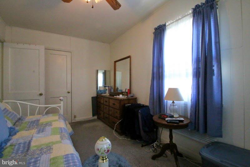 1904 Nevill Road Baltimore, MD 21222 - Photo 18 of 30 a living room with furniture and a window