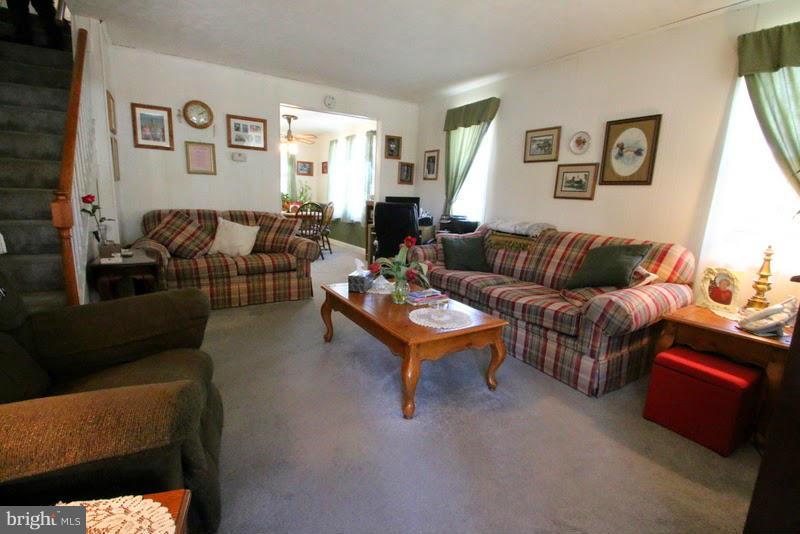 1904 Nevill Road Baltimore, MD 21222 - Photo 3 of 30 a living room with furniture and a couch