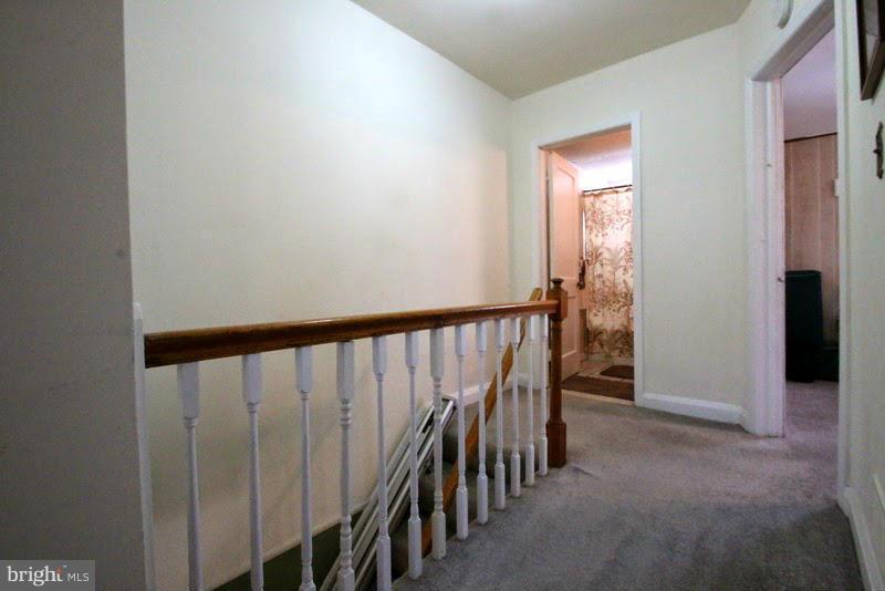 1904 Nevill Road Baltimore, MD 21222 - Photo 22 of 30 a view of a hallway with wooden floor