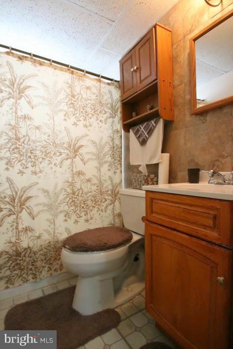 1904 Nevill Road Baltimore, MD 21222 - Photo 23 of 30 a bathroom with a toilet and a shower