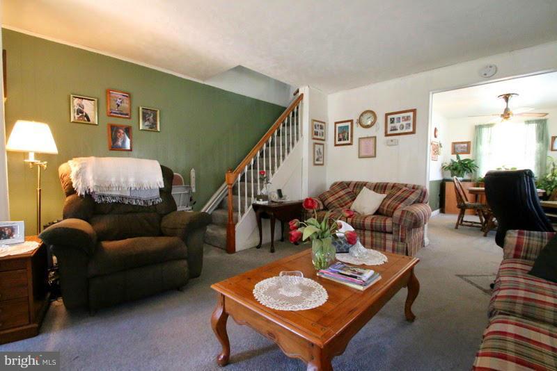 1904 Nevill Road Baltimore, MD 21222 - Photo 4 of 30 a living room with furniture and a wooden floor