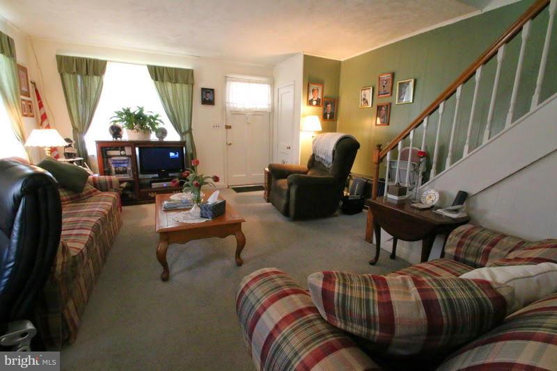 1904 Nevill Road Baltimore, MD 21222 - Photo 5 of 30 a living room with furniture and a window