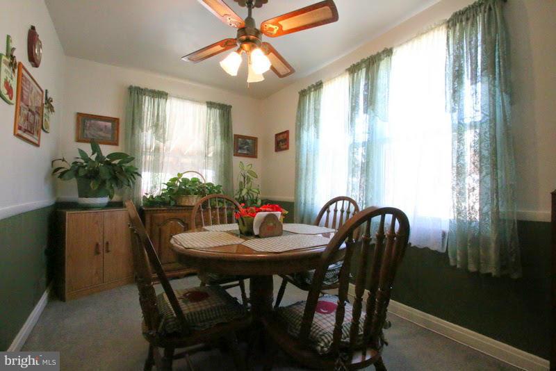 1904 Nevill Road Baltimore, MD 21222 - Photo 8 of 30 a dining room with furniture and window