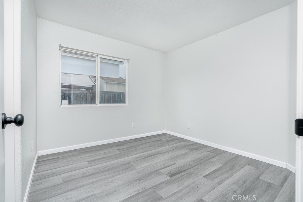 4680 Birchleaf Lane Hemet, CA 92545 - Photo 15 of 34 wooden floor in an empty room