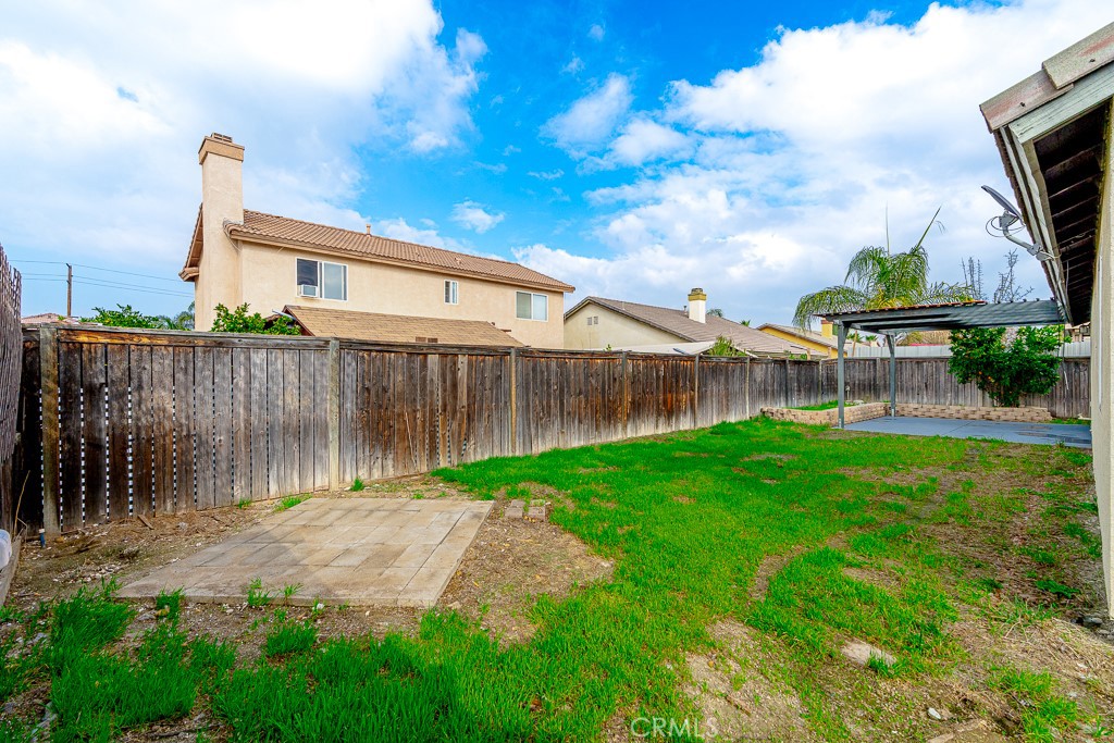 4680 Birchleaf Lane Hemet, CA 92545 - Photo 21 of 34 a view of a backyard with a garden