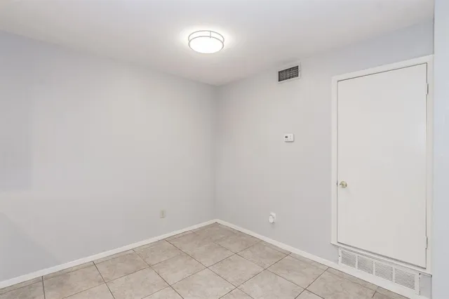 a kitchen with a sink stove and refrigerator