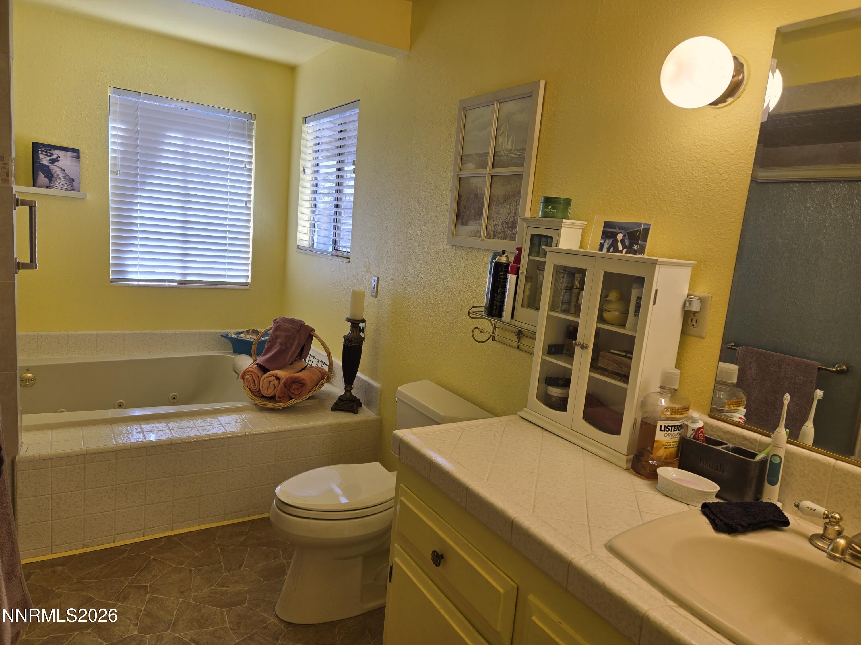 775 Meadow Valley Street Pioche, NV 89043 - Photo 15 of 26 a bathroom with a sink and a toilet