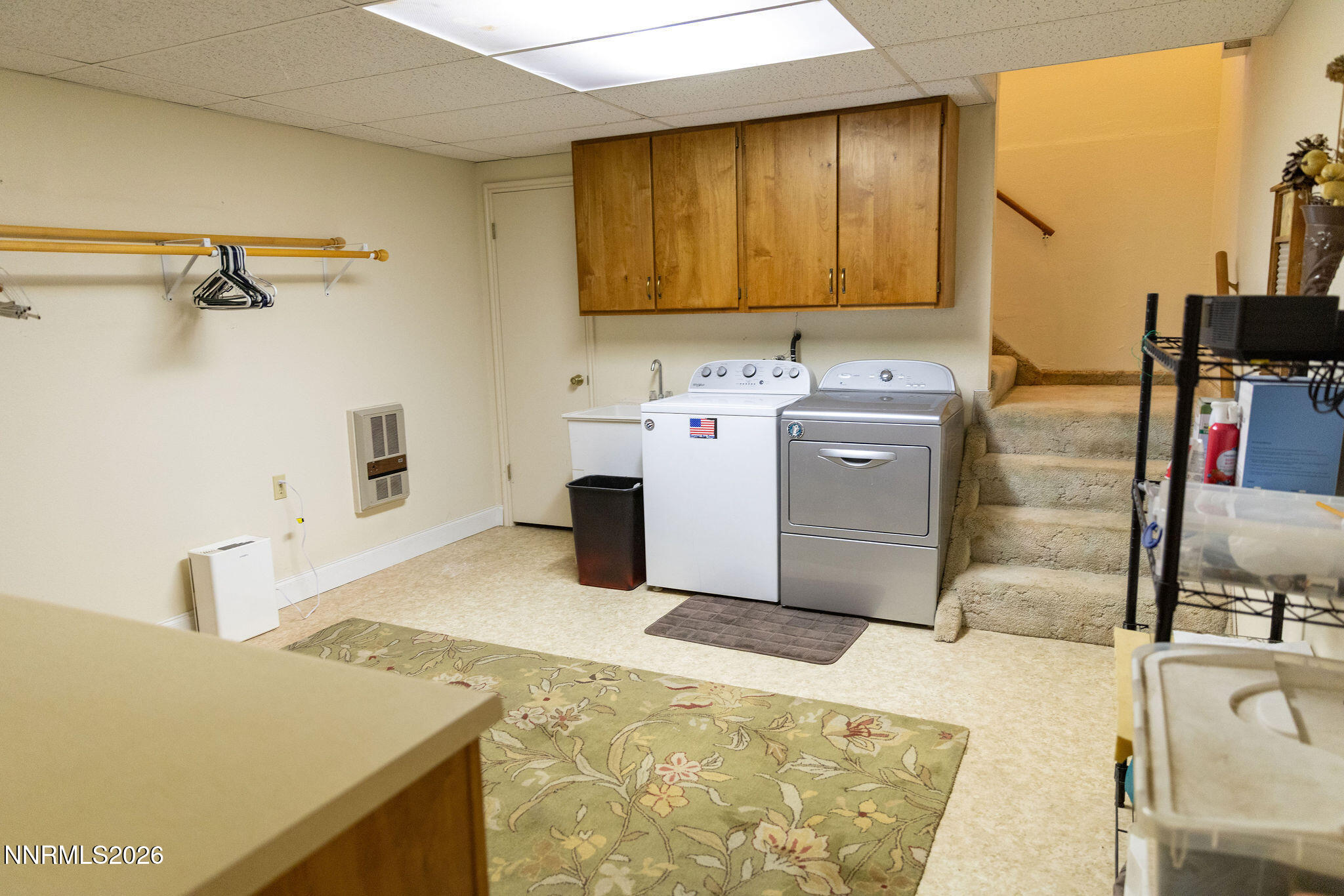 775 Meadow Valley Street Pioche, NV 89043 - Photo 21 of 26 a kitchen with a sink stove and cabinets