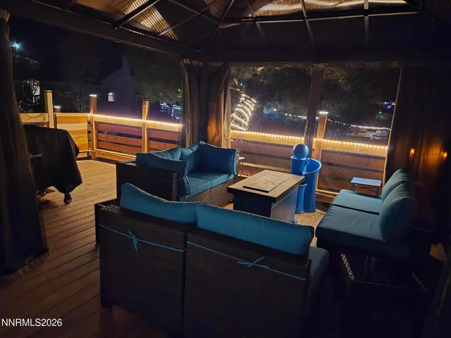 a outdoor space with patio couch and a table