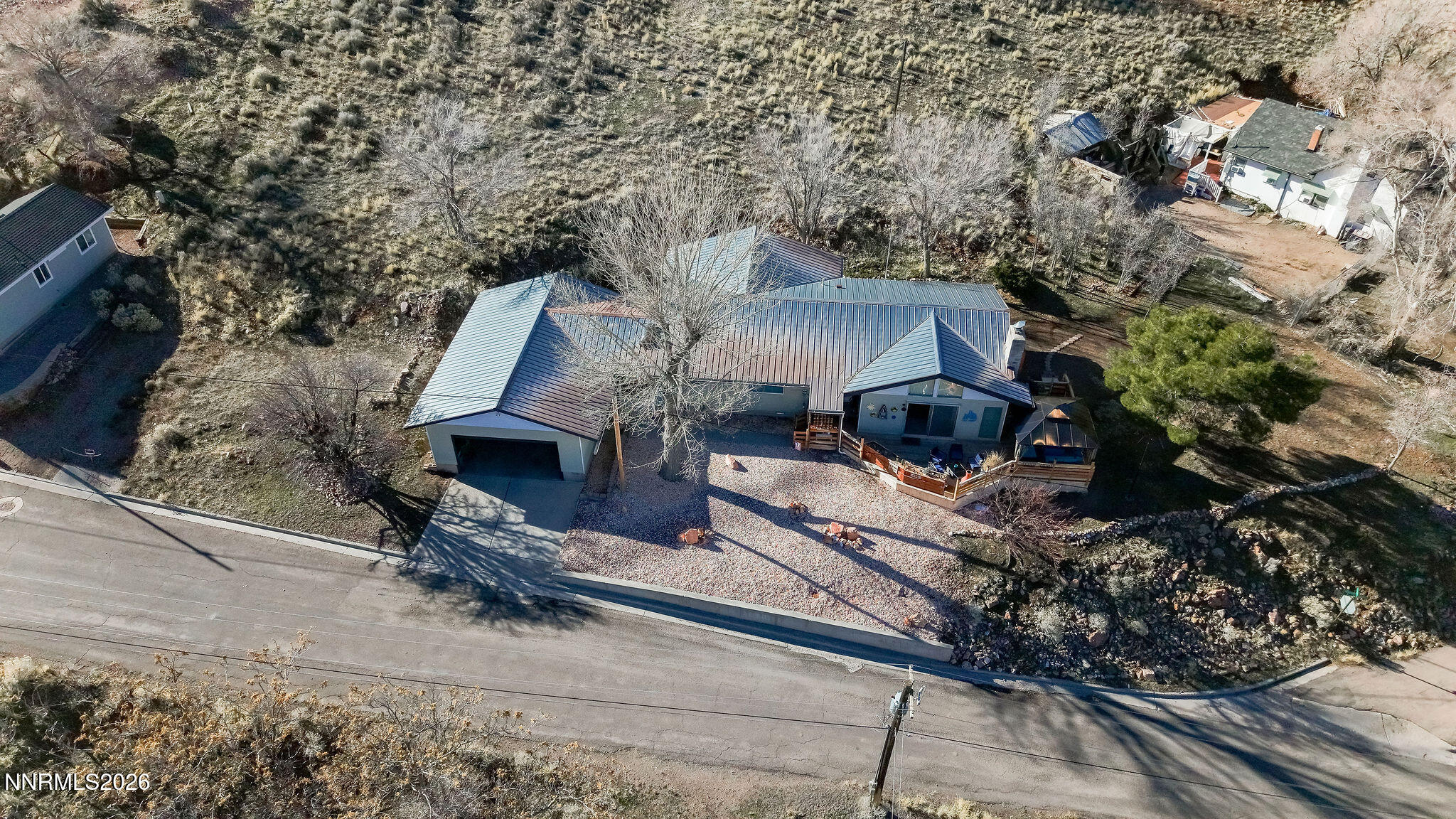 775 Meadow Valley Street Pioche, NV 89043 - Photo 4 of 26 a front view of a house with garden