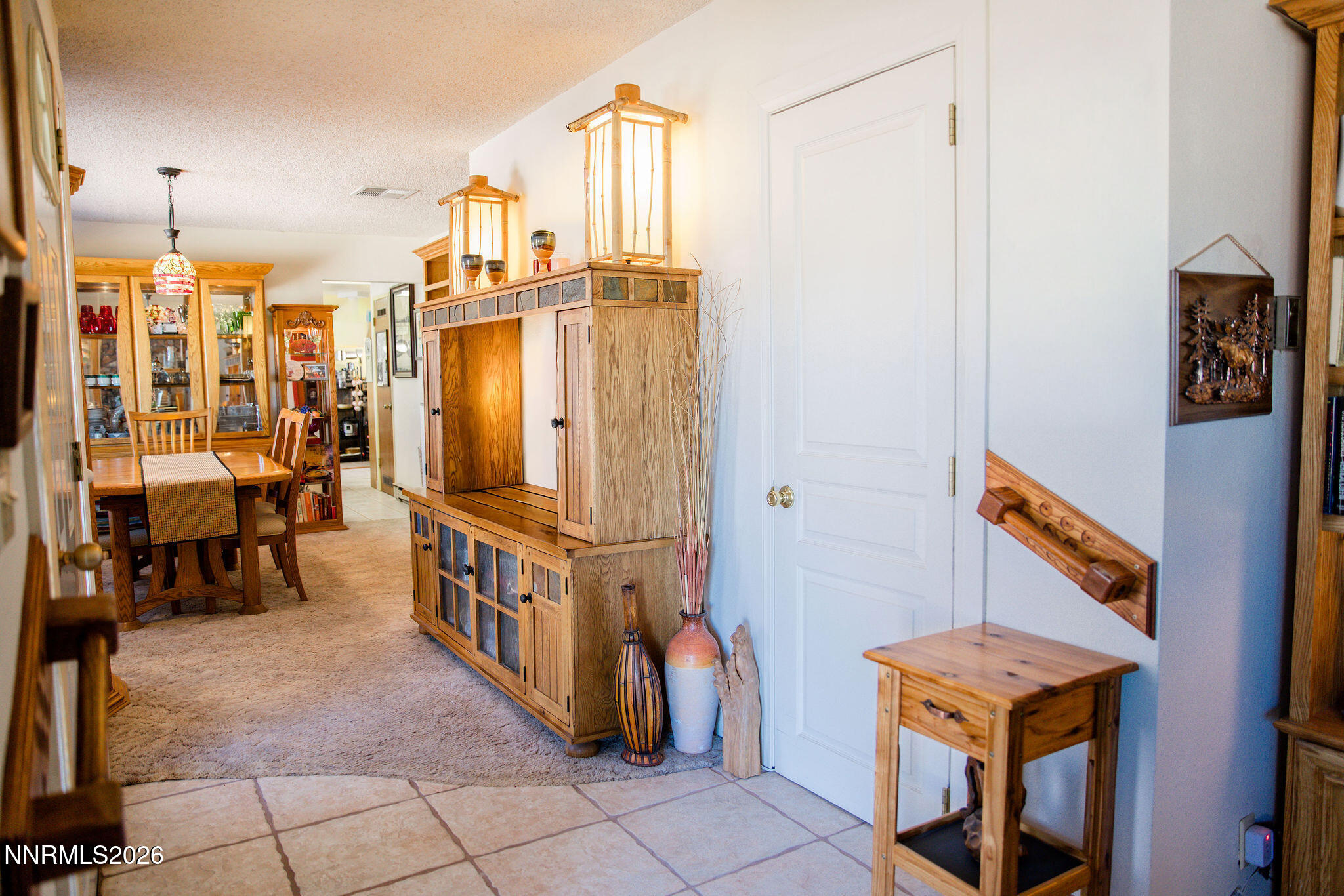 775 Meadow Valley Street Pioche, NV 89043 - Photo 5 of 26 a view of an chairs and tables in the balcony