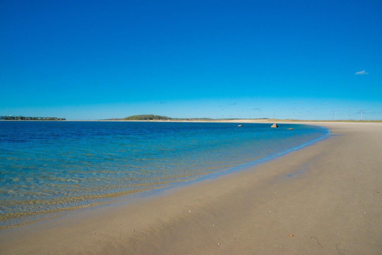 104 Rocky Point Road Bourne, MA 02532 - Photo 2 of 22 a view of an ocean beach