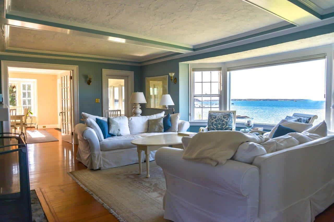 104 Rocky Point Road Bourne, MA 02532 - Photo 9 of 22 a living room with furniture and a large window