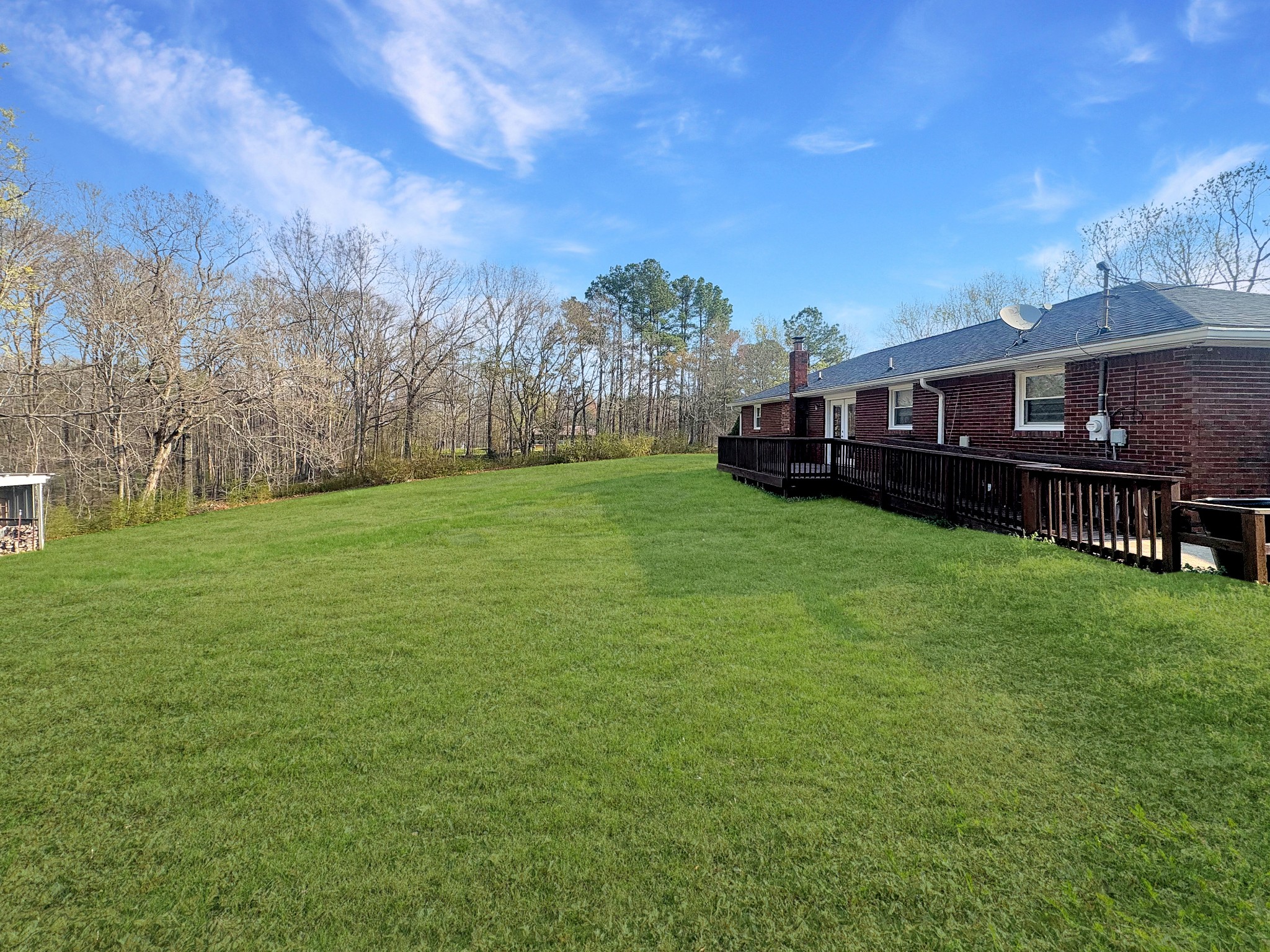 75 Towering Oaks Road Tennessee Ridge, TN 37178 - Photo 17 of 18 a view of a house with a big yard