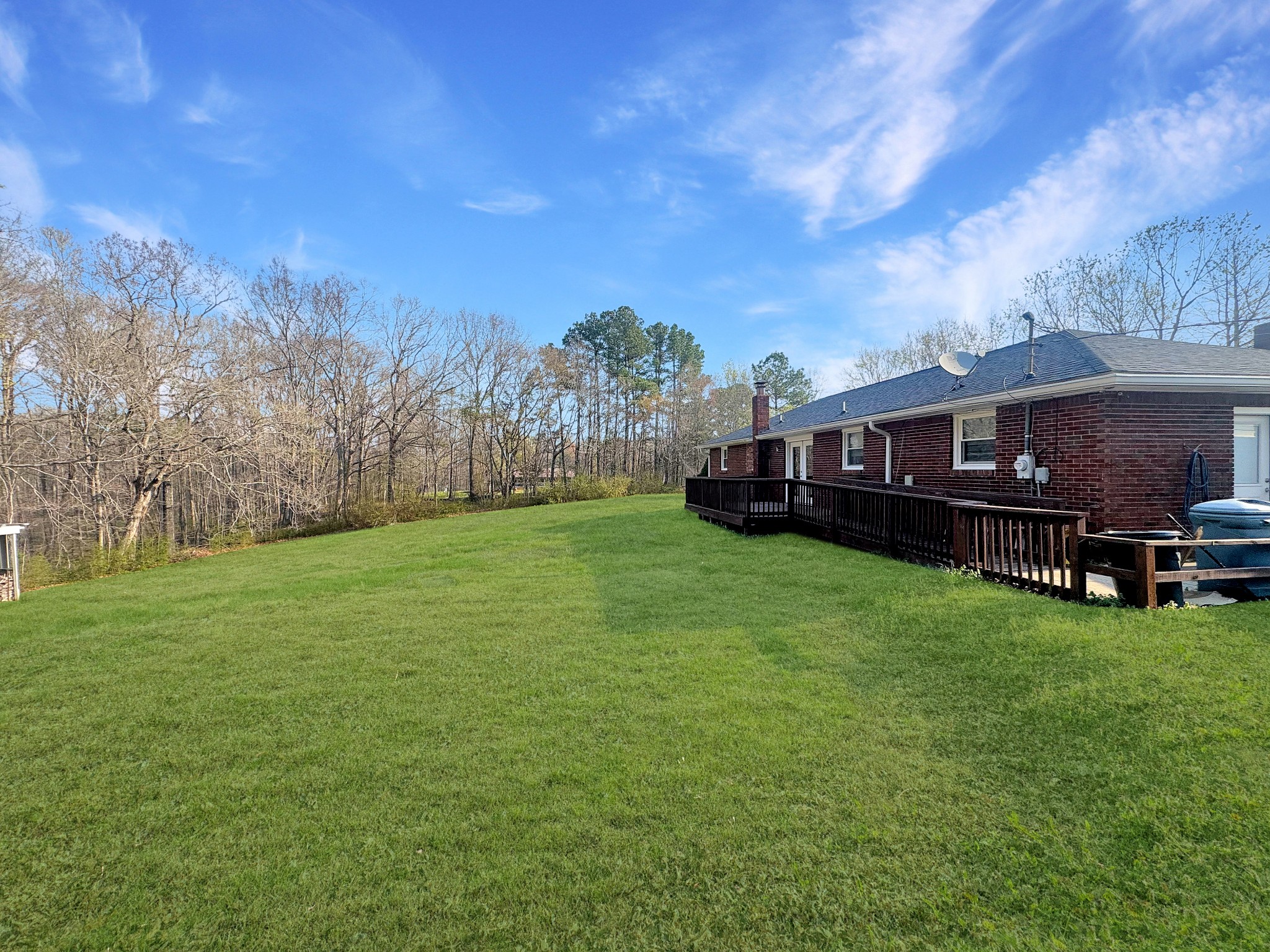 75 Towering Oaks Road Tennessee Ridge, TN 37178 - Photo 18 of 18 a view of a house with a big yard