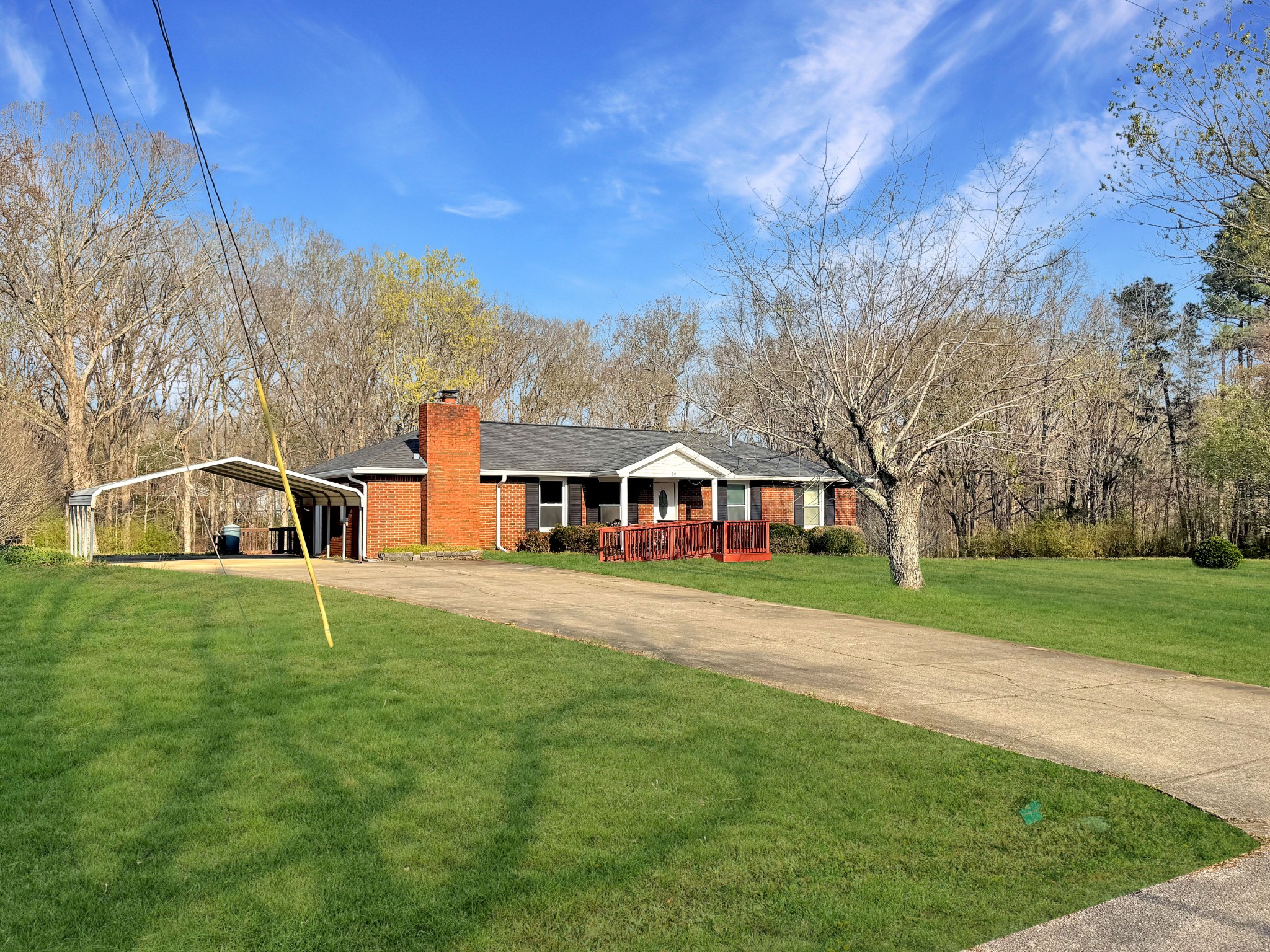 75 Towering Oaks Road Tennessee Ridge, TN 37178 - Photo 2 of 18 a front view of a house with a yard
