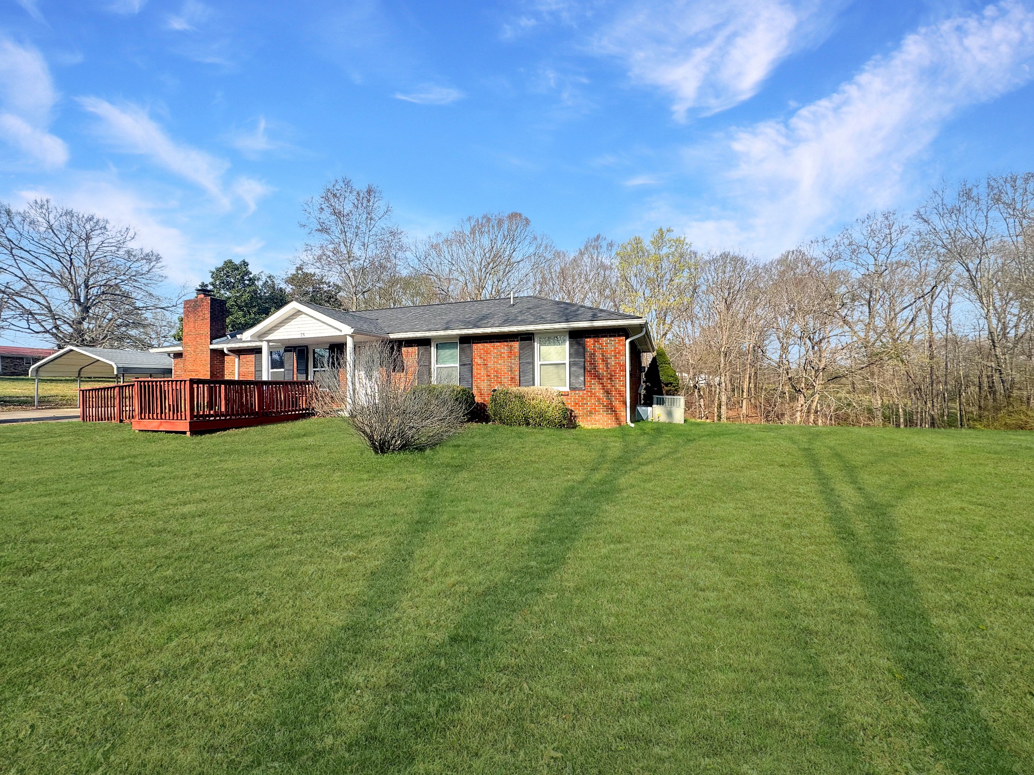 75 Towering Oaks Road Tennessee Ridge, TN 37178 - Photo 3 of 18 a front view of house with yard and green space