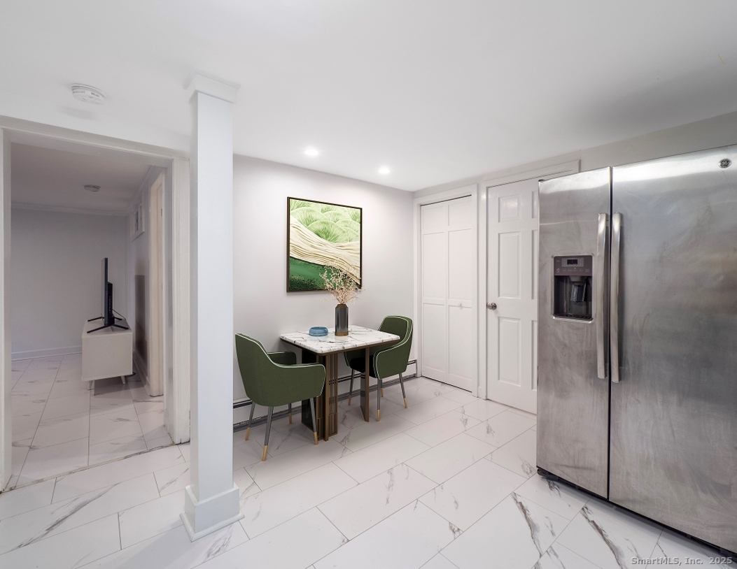 74 Lakeview Avenue New Canaan, CT 06840 - Photo 13 of 15 a view of a livingroom with furniture and a window