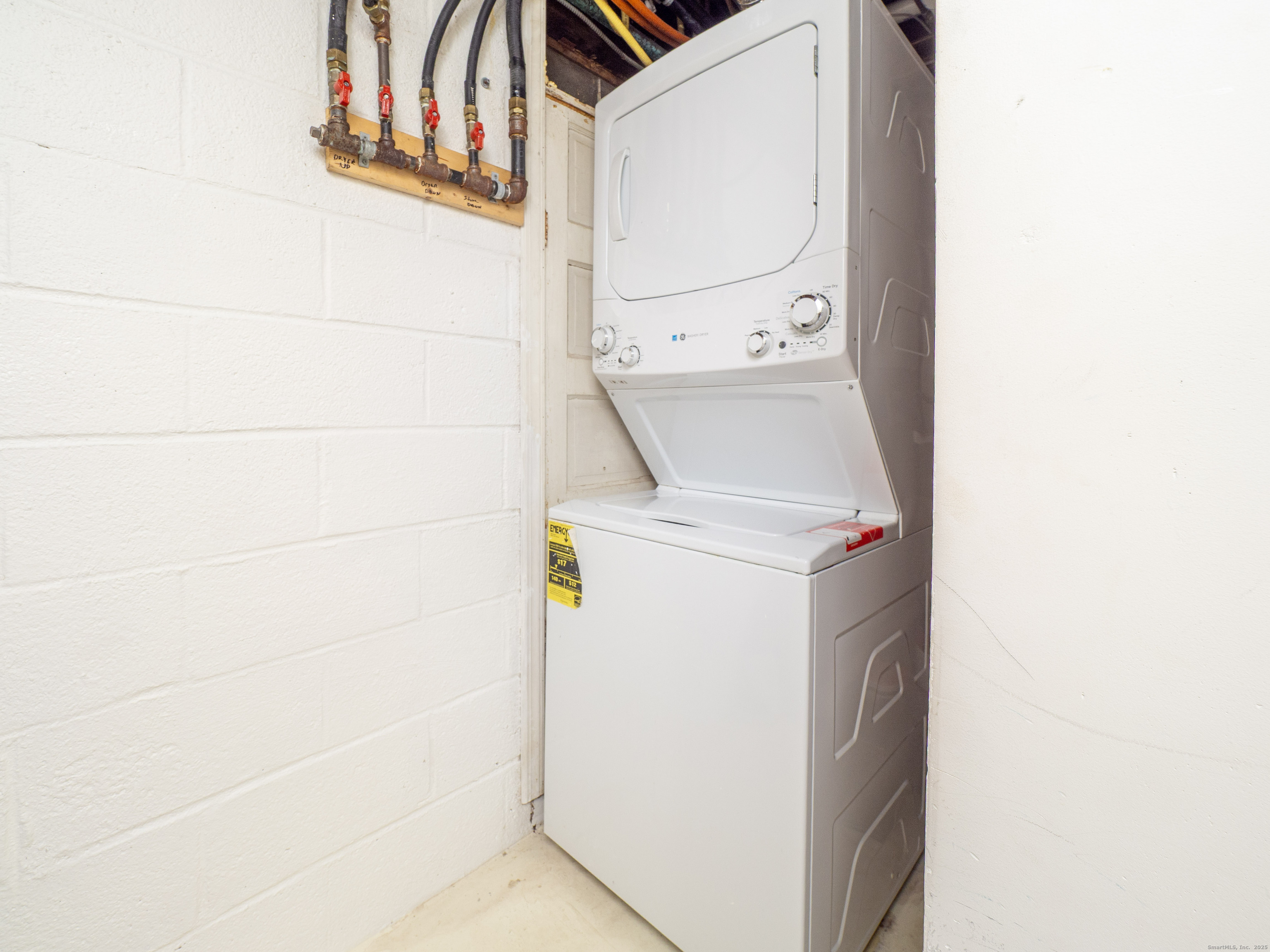 74 Lakeview Avenue New Canaan, CT 06840 - Photo 14 of 15 a utility room with dryer and washer
