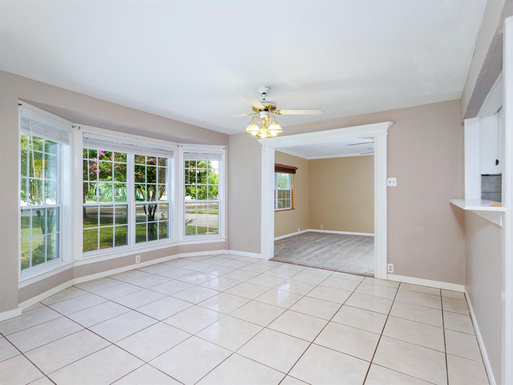 4002 Austin Avenue Brownwood, TX 76801 - Photo 4 of 34 a view of an empty room with a window