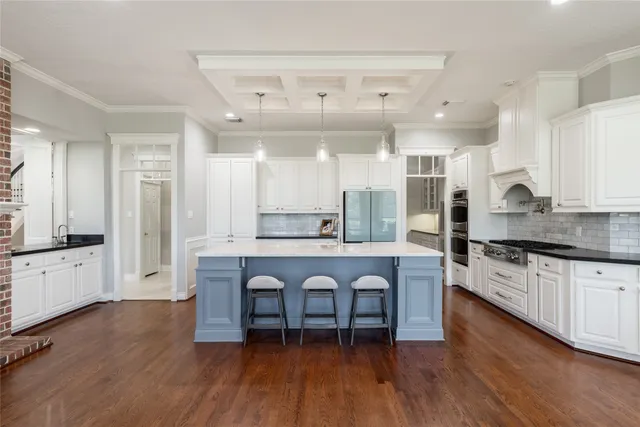 an empty room with fan and windows