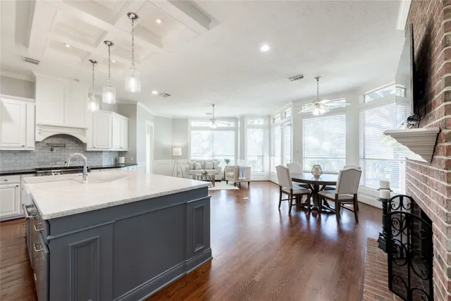 a bathroom with a toilet a sink a mirror a bathtub and shower