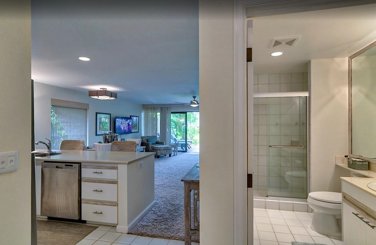 2777 South Kihei Road, Unit D109 Kihei, HI 96753 - Photo 21 of 50 a bathroom with a double vanity sink toilet and shower