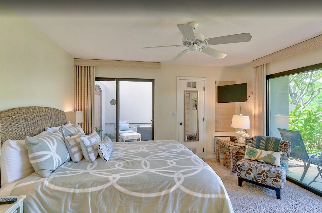 2777 South Kihei Road, Unit D109 Kihei, HI 96753 - Photo 34 of 50 a living room with furniture and a large window