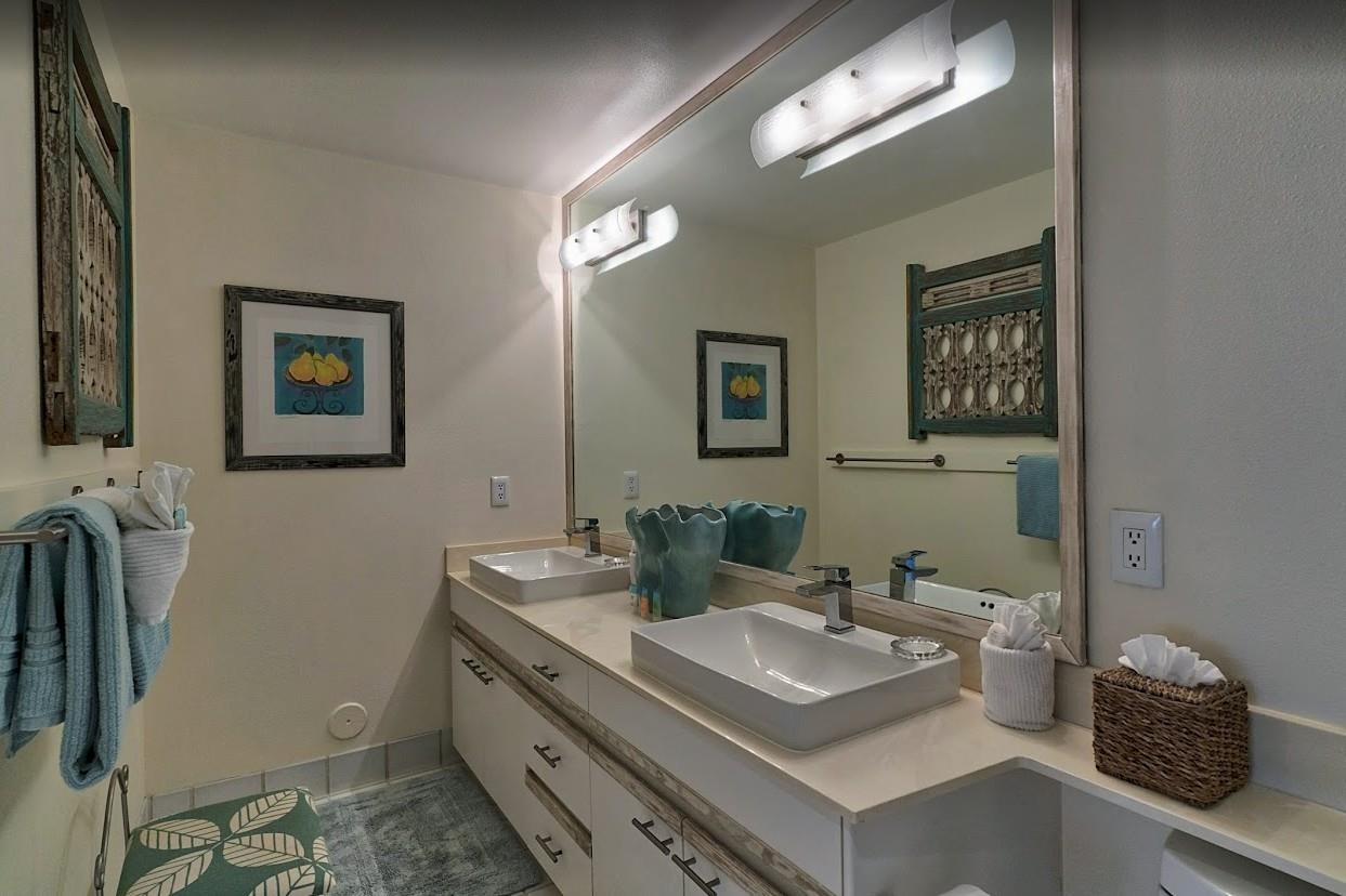 2777 South Kihei Road, Unit D109 Kihei, HI 96753 - Photo 39 of 50 a bathroom with a sink and a mirror