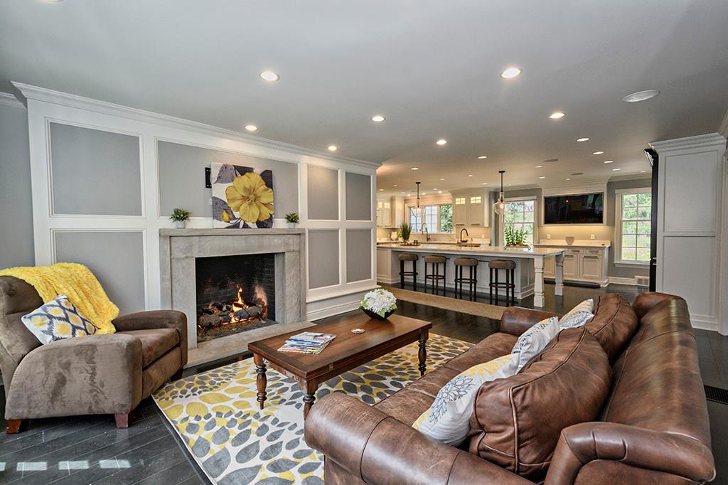 118 Field Club Road Pittsburgh, PA 15238 - Photo 3 of 25 Family room off of kitchen with wet bar and gas log burning fire place and doors to the rear patio and back yard.