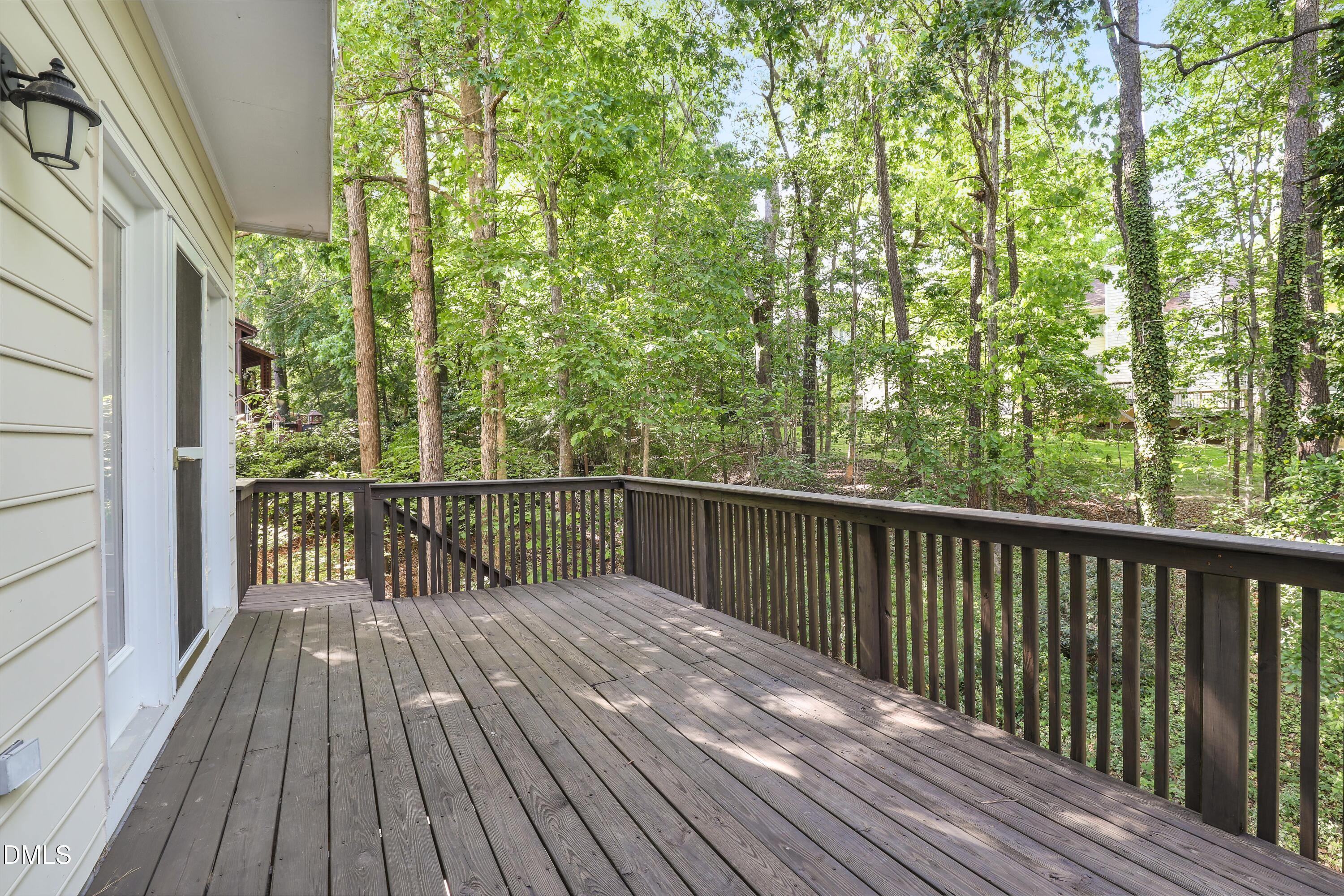 15 Preakness Drive Durham, NC 27713 - Photo 13 of 32 a view of balcony with wooden floor
