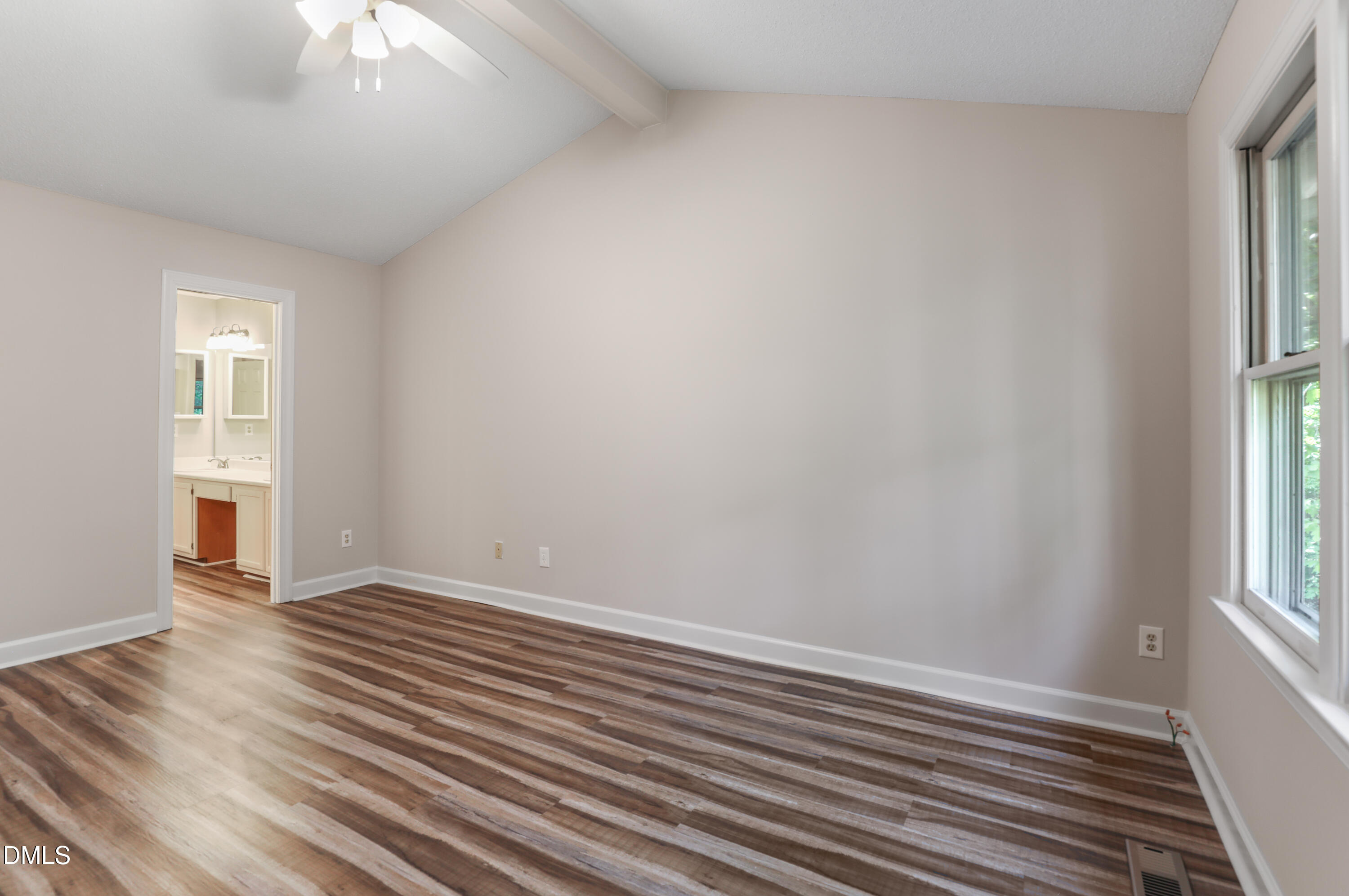 15 Preakness Drive Durham, NC 27713 - Photo 20 of 32 wooden floor in an empty room with a window