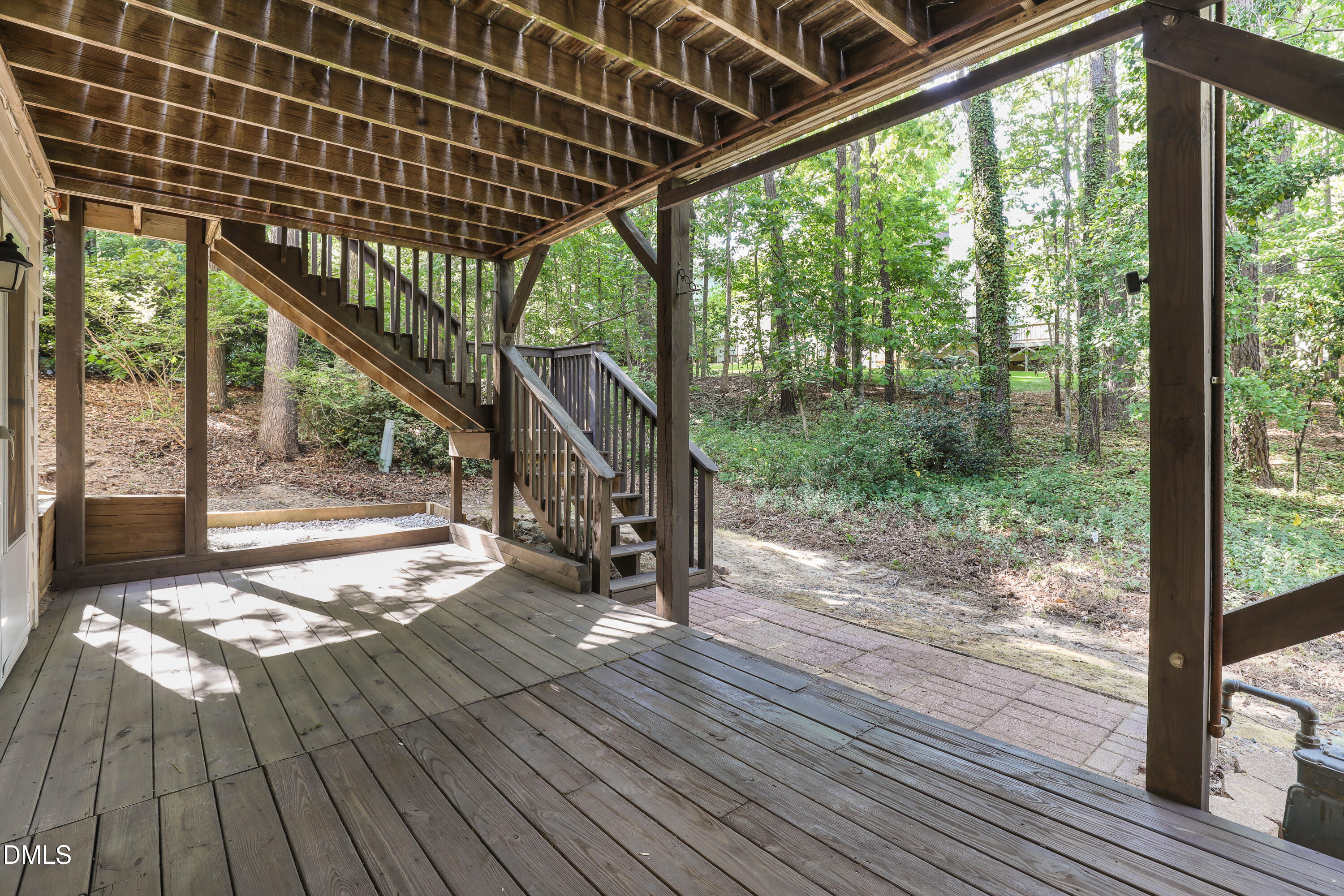 15 Preakness Drive Durham, NC 27713 - Photo 30 of 32 a view of porch with wooden floor in front of house