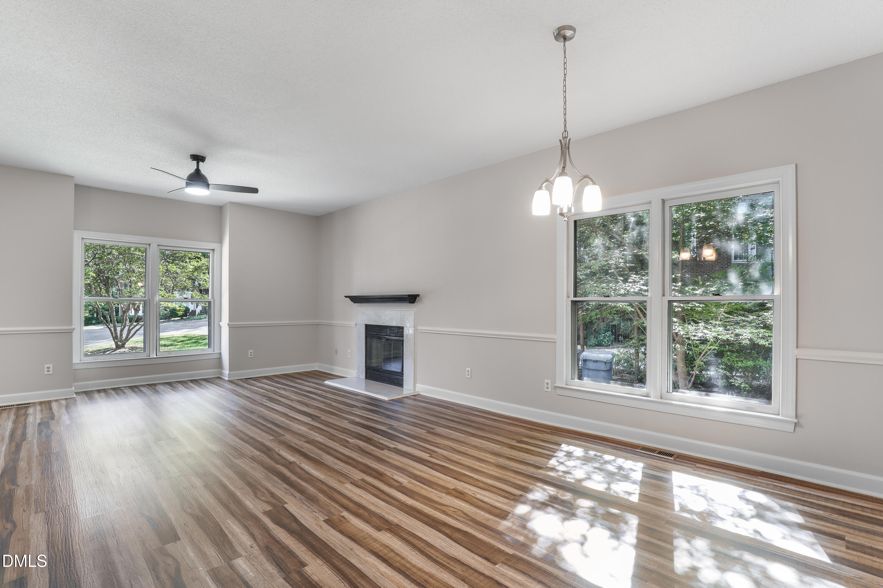 15 Preakness Drive Durham, NC 27713 - Photo 4 of 32 a view of a room with window wooden floor and front door