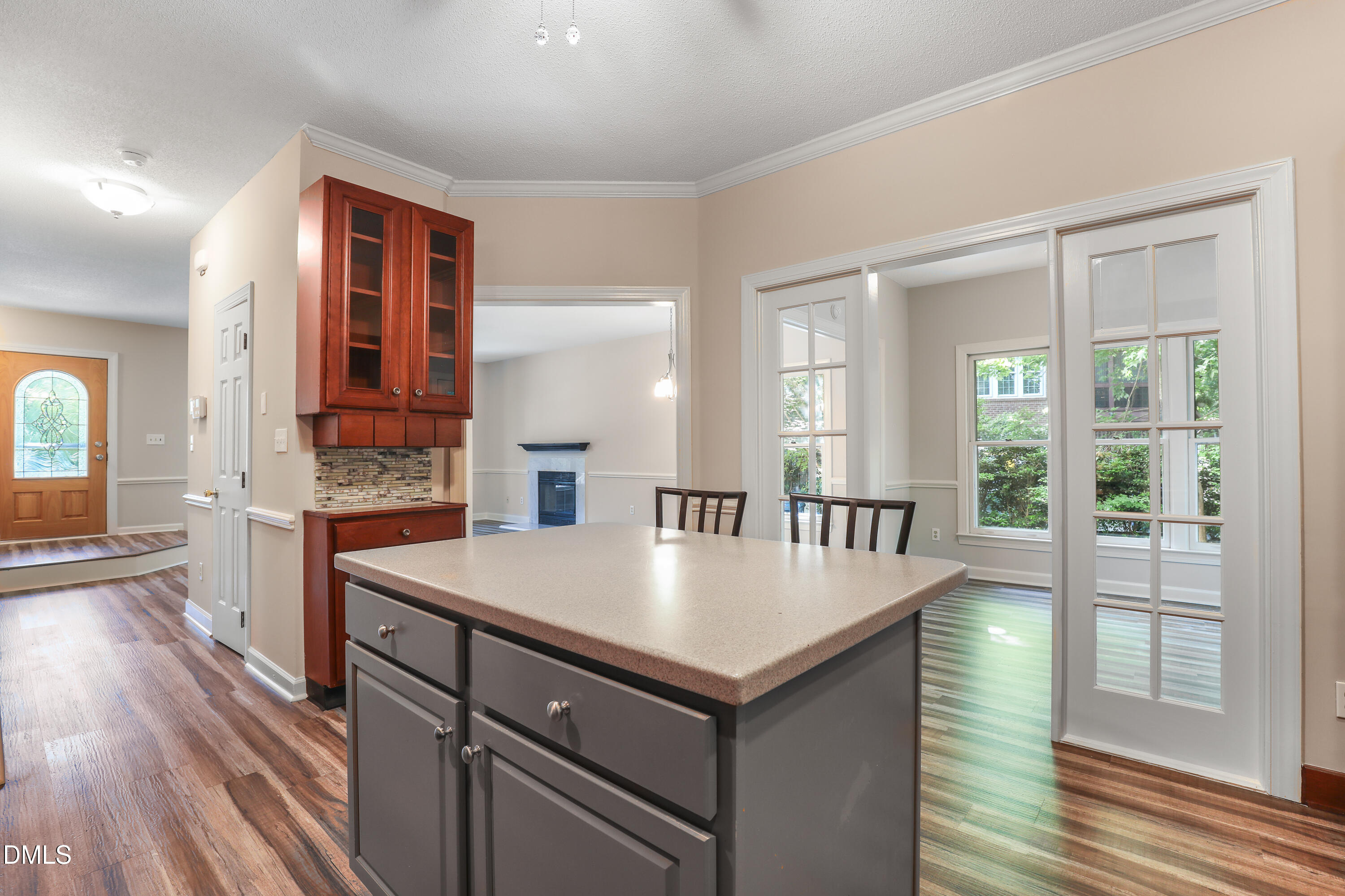 15 Preakness Drive Durham, NC 27713 - Photo 7 of 32 a large kitchen with kitchen island a sink appliances and a counter space