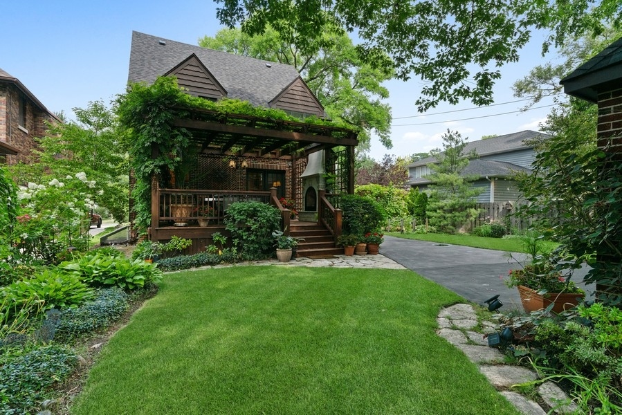 727 Indian Road Glenview, IL 60025 - Photo 47 of 58 a front view of a house with a yard