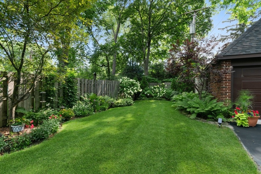 727 Indian Road Glenview, IL 60025 - Photo 51 of 58 a view of a garden with large trees