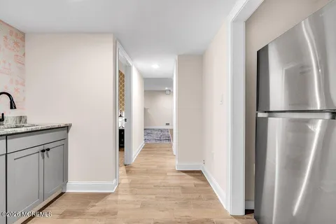 a view of a kitchen from the hallway