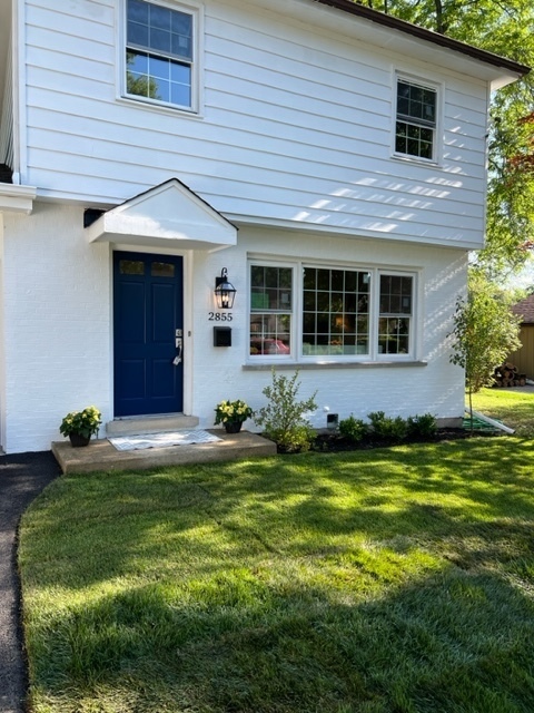 2855 Koepke Road Northbrook, IL 60062 - Photo 1 of 18 a house that has a big yard in front of it