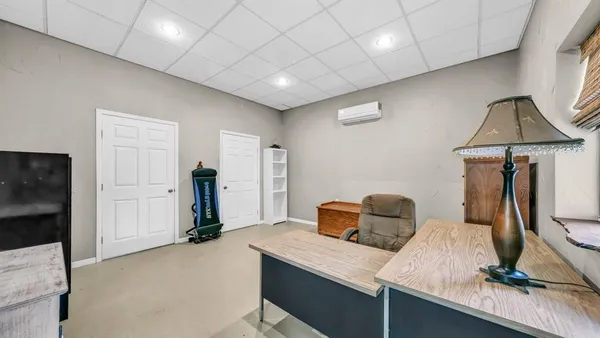 a view of a livingroom with furniture