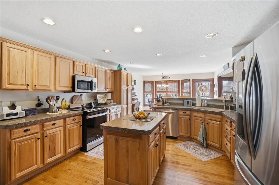 5300 Brookshire Lane Springfield, OH 45502 - Photo 18 of 56 This spacious kitchen offers a central island and abundant natural light.