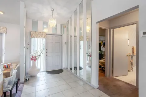 a bathroom with a shower and a sink