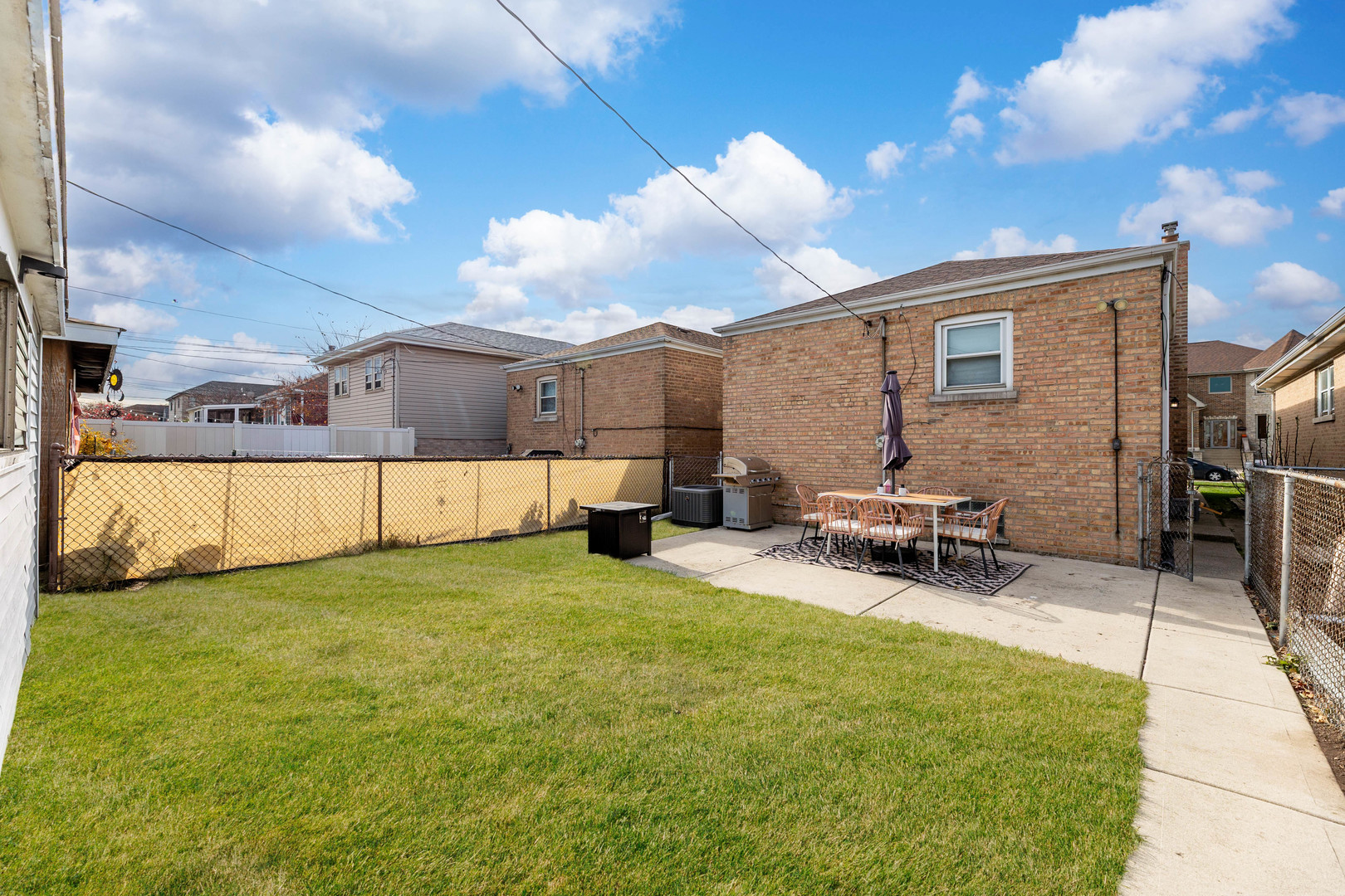 5105 South Mobile Avenue Chicago, IL 60638 - Photo 17 of 21 a view of a backyard with a patio