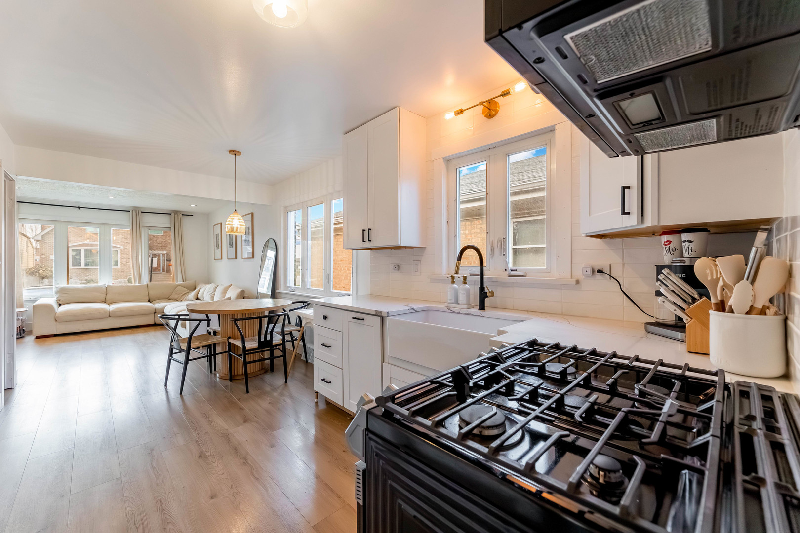 5105 South Mobile Avenue Chicago, IL 60638 - Photo 10 of 21 a kitchen with a table chairs stove and cabinets